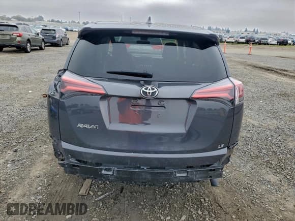 ✅ 2018 Toyota RAV4 LE • VIN: 2T3ZFREV7JW496121 • Lot: 94075675. Listed on Copart with 94,119 mi. Free auction sales archive from the USA and detailed vehicle history report at DreamBid. Image 6.