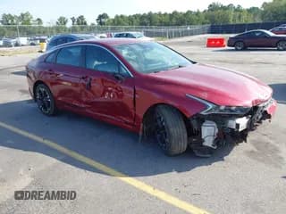 ✅ 2021 Kia K5 GT-Line • VIN: 5XXG64J27MG019816 • Lot: 43148243. Listed on IAAI with 107,902 mi. Free auction sales archive from the USA and detailed vehicle history report at DreamBid. Image 1.