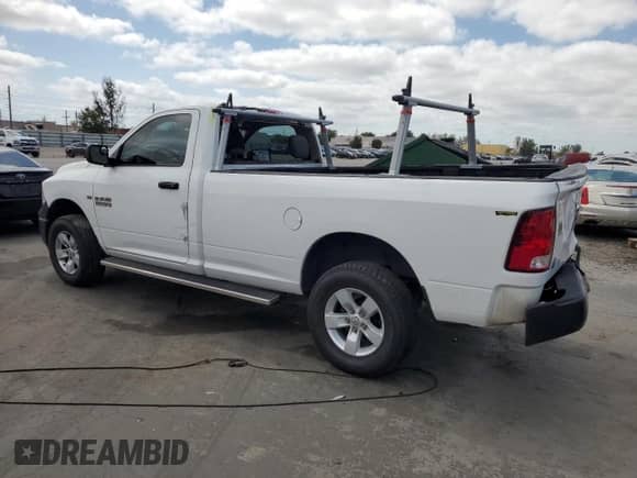 2015 Ram 1500 Tradesman with VIN 3C6JR6DG2FG647550, listed as a Copart auction lot 54125115 with 217,629 mi miles and Salvage title. Bid and sale history available at DreamBid. Image 2.