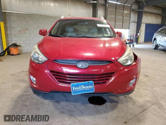 2014 Hyundai Tucson SE z VIN KM8JUCAG4EU798570, wystawiony jako Copart lot #71097605 z przebiegiem 98 818 mil mil oraz Szkoda całkowita • Salvage title. Historia ofert i sprzedaży dostępna na DreamBid. Obrazek 5.