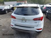 ✅ 2017 Hyundai Santa Fe 2.4L • VIN: 5NMZUDLB1HH002299 • Lot: 43256960. Listed on IAAI with 95,485 mi. Free auction sales archive from the USA and detailed vehicle history report at DreamBid. Image 17.