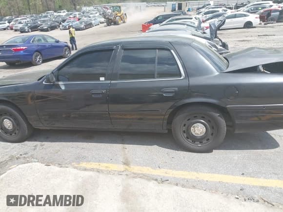 ✅ 2004 Ford Police Interceptor Base w/3.27 Axle • VIN: 2FAFP71W34X136279 • Lot: 41945086. Wystawiony na IAAI z przebiegiem 151 350 mil. Bezpłatny archiwum sprzedaży aukcyjnych z USA i szczegółowy raport historii pojazdu na DreamBid. Zdjęcie 14.