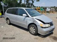 ✅ 2002 Honda Odyssey EX-L • VIN: 2HKRL18072H583925 • Лот: 66036375. Опубликован ранее на Copart с пробегом 180 378 миль. Бесплатный доступ к архиву аукционных продаж из США и подробный отчёт об истории автомобиля на DreamBid. Изображение 4.
