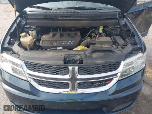 2015 Dodge Journey American Value z VIN 3C4PDCABXFT610861, wystawiony jako IAAI lot #43068421 z przebiegiem 153 937 mil mil oraz . Historia ofert i sprzedaży dostępna na DreamBid. Obrazek 10.