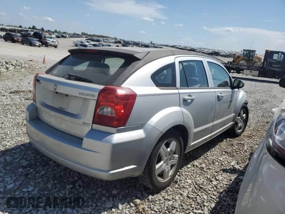 ✅ 2009 Dodge Caliber SXT • VIN: 1B3HB48A79D165679 • Лот: 69765994. Опубликован ранее на Copart с пробегом 191 179 миль. Бесплатный доступ к архиву аукционных продаж из США и подробный отчёт об истории автомобиля на DreamBid. Изображение 3.