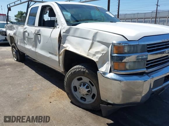 ✅ 2015 Chevrolet Silverado 2500HD Work Truck • VIN: 1GC2CUEGXFZ105548 • Lot: 42816741. Listed on IAAI with 249,611 mi. Free auction sales archive from the USA and detailed vehicle history report at DreamBid. Image 6.