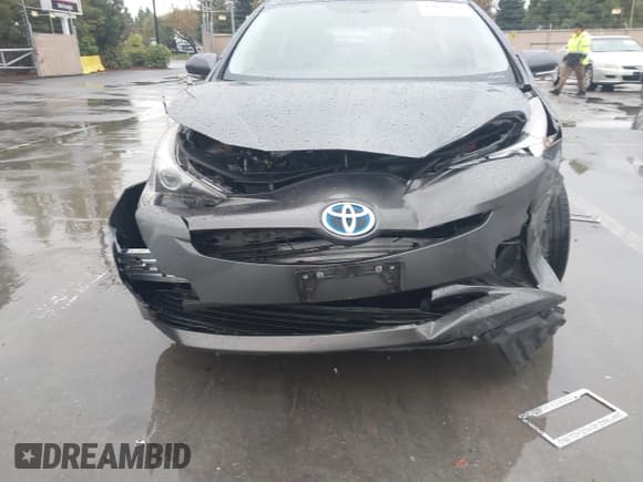 ✅ 2016 Toyota Prius Two • VIN: JTDKBRFU2G3023256 • Lot: 43667464. Listed on IAAI with 71,608 mi. Free auction sales archive from the USA and detailed vehicle history report at DreamBid. Image 6.