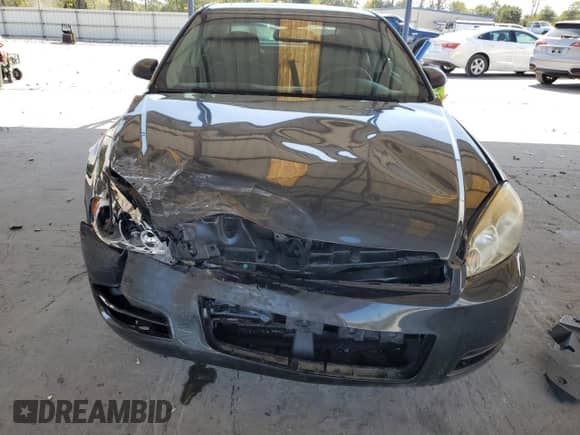 2014 Chevrolet Impala LT с VIN 2G1WB5E31E1178881, выставлен на аукционе Copart как лот 81913005 с пробегом 96 482 миль миль и Списание • Salvage title. История ставок и продаж доступна на DreamBid. Изображение 5.