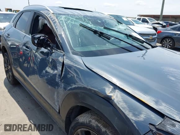 ✅ 2022 Mazda CX-30 S Carbon Edition • VIN: 3MVDMBCL6NM410330 • Lot: 42107426. Listed on IAAI with 30,277 mi. Free auction sales archive from the USA and detailed vehicle history report at DreamBid. Image 6.