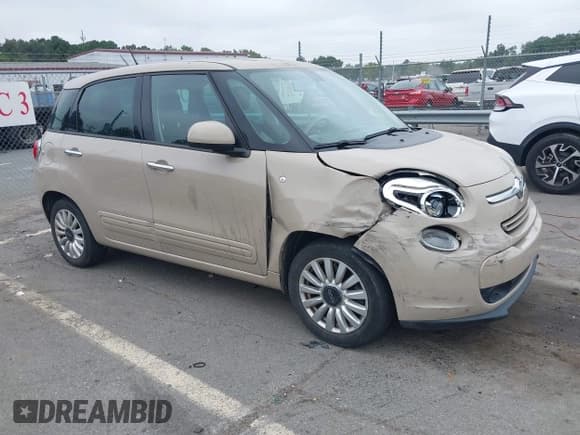 ✅ 2014 FIAT 500L Easy • VIN: ZFBCFABH1EZ012569 • Лот: 43310355. Опубликован ранее на IAAI с пробегом 128 566 миль. Бесплатный доступ к архиву аукционных продаж из США и подробный отчёт об истории автомобиля на DreamBid. Изображение 1.