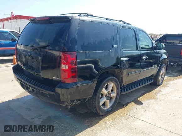 2008 Chevrolet Tahoe 2LT with VIN 1GNFC13098R136161, listed as a IAAI auction lot 42250146 with 328,795 mi miles and . Bid and sale history available at DreamBid. Image 4.