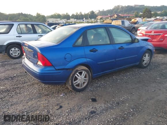 ✅ 2003 Ford Focus SE • VIN: 1FAFP34383W263730 • Lot: 42836839. Listed on IAAI with 147,874 mi. Free auction sales archive from the USA and detailed vehicle history report at DreamBid. Image 4.