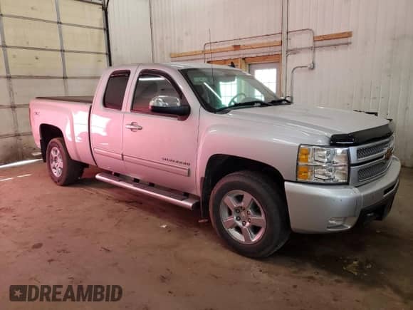2013 Chevrolet Silverado 1500 LTZ with VIN 1GCRKTE75DZ264423, listed as a Copart auction lot 84403155 with 81,379 mi miles and Salvage title. Bid and sale history available at DreamBid. Image 4.