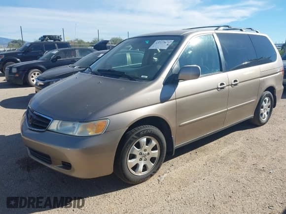 ✅ 2004 Honda Odyssey EX-L • VIN: 5FNRL18984B085040 • Lot: 43727073. Wystawiony na IAAI z przebiegiem 238 489 mil. Bezpłatny archiwum sprzedaży aukcyjnych z USA i szczegółowy raport historii pojazdu na DreamBid. Zdjęcie 2.