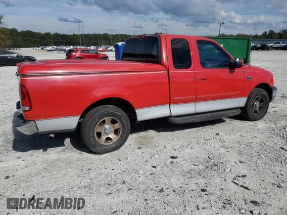 ✅ 2001 Ford F-150 XL • VIN: 1FTRX17L41NA21463 • Lot: 85156825. Listed on Copart with 194,691 mi. Free auction sales archive from the USA and detailed vehicle history report at DreamBid. Image 3.