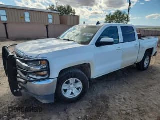✅ 2018 Chevrolet Silverado 1500 LT • VIN: 3GCUKREC0JG331290 • Лот: 86150735. Опубликован ранее на Copart с пробегом 172 777 миль. Бесплатный доступ к архиву аукционных продаж из США и подробный отчёт об истории автомобиля на DreamBid. Изображение 1.