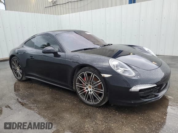 ✅ 2015 Porsche 911 Carrera S • VIN: WP0AB2A91FS110169 • Lot: 77675634. Listed on Copart with 26,256 mi. Free auction sales archive from the USA and detailed vehicle history report at DreamBid. Image 4.