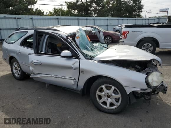 ✅ 2002 Mercury Sable LS Premium • VIN: 1MEHM59S12G607493 • Lot: 78230594. Listed on Copart with 127,913 mi. Free auction sales archive from the USA and detailed vehicle history report at DreamBid. Image 4.