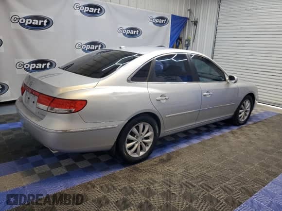 ✅ 2007 Hyundai Azera SE • VIN: KMHFC46F67A239170 • Лот: 63229605. Размещён на Copart с пробегом 182 044 миль миль. Получите бесплатный доступ к архиву аукционных продаж из США и посмотрите подробный отчёт об истории автомобиля на DreamBid. Изображение 3.