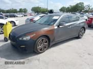 ✅ 2015 Infiniti Q50 Premium • VIN: JN1BV7AP8FM352195 • Lot: 41968813. Wystawiony na IAAI z przebiegiem 146 542 mil. Bezpłatny archiwum sprzedaży aukcyjnych z USA i szczegółowy raport historii pojazdu na DreamBid. Zdjęcie 17.