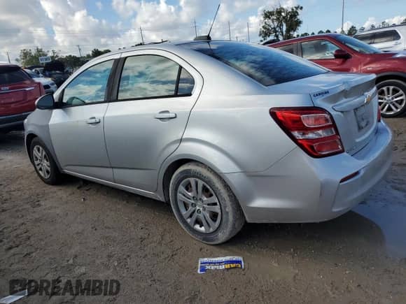 2017 Chevrolet Sonic LS с VIN 1G1JB5SH1H4147231, выставлен на аукционе Copart как лот 73783294 с пробегом Не указан миль и Списание • Salvage title. История ставок и продаж доступна на DreamBid. Изображение 2.