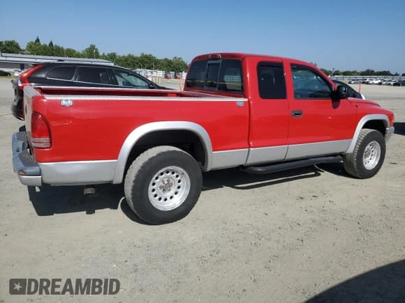 ✅ 2003 Dodge Dakota • VIN: 1D7GG42N43S185341 • Lot: 56236135. Wystawiony na Copart z przebiegiem 208 390 mil. Bezpłatny archiwum sprzedaży aukcyjnych z USA i szczegółowy raport historii pojazdu na DreamBid. Zdjęcie 3.