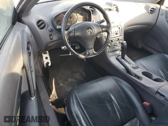 ✅ 2000 Toyota Celica GTS • VIN: JTDDY32T7Y0023659 • Lot: 85161564. Wystawiony na Copart z przebiegiem 140 772 mil. Bezpłatny archiwum sprzedaży aukcyjnych z USA i szczegółowy raport historii pojazdu na DreamBid. Zdjęcie 8.