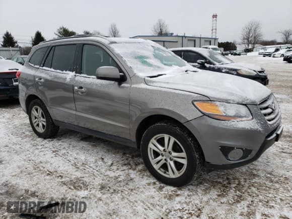 ✅ 2011 Hyundai Santa Fe Limited • VIN: 5XYZHDAG1BG076312 • Lot: 41962305. Listed on Copart with 171,271 mi. Free auction sales archive from the USA and detailed vehicle history report at DreamBid. Image 4.