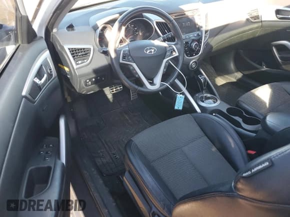 ✅ 2013 Hyundai Veloster w/Gray Int • VIN: KMHTC6AD9DU135593 • Lot: 79876314. Listed on Copart with 91,162 mi. Free auction sales archive from the USA and detailed vehicle history report at DreamBid. Image 8.