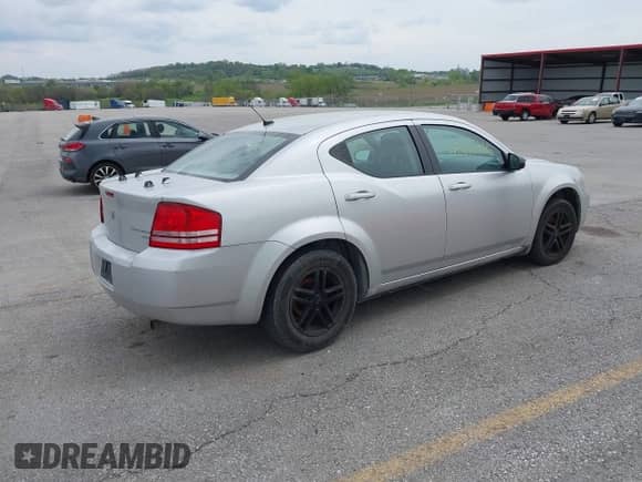 2010 Dodge Avenger SXT with VIN 1B3CC4FD3AN165228, listed as a IAAI auction lot 42010765 with 209,327 mi miles and . Bid and sale history available at DreamBid. Image 4.