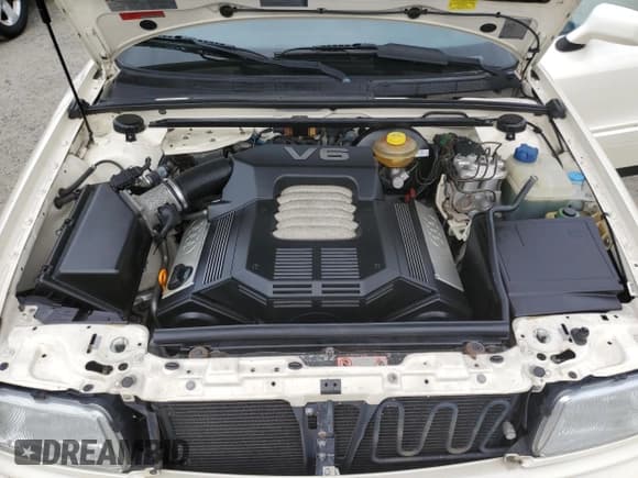 ✅ 1996 Audi Cabriolet • VIN: WAUAA88G1TA003857 • Лот: 80161455. Опубликован ранее на Copart с пробегом 91 236 миль. Бесплатный доступ к архиву аукционных продаж из США и подробный отчёт об истории автомобиля на DreamBid. Изображение 11.