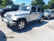 ✅ 2008 Jeep Wrangler Unlimited Sahara • VIN: 1J8GA591X8L628123 • Lot: 43102623. Listed on IAAI with 231,500 mi. Free auction sales archive from the USA and detailed vehicle history report at DreamBid. Image 2.