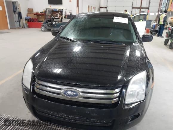 ✅ 2007 Ford Fusion SE • VIN: 3FAHP07Z97R275689 • Lot: 42040917. Wystawiony na IAAI z przebiegiem 183 886 mil. Bezpłatny archiwum sprzedaży aukcyjnych z USA i szczegółowy raport historii pojazdu na DreamBid. Zdjęcie 12.