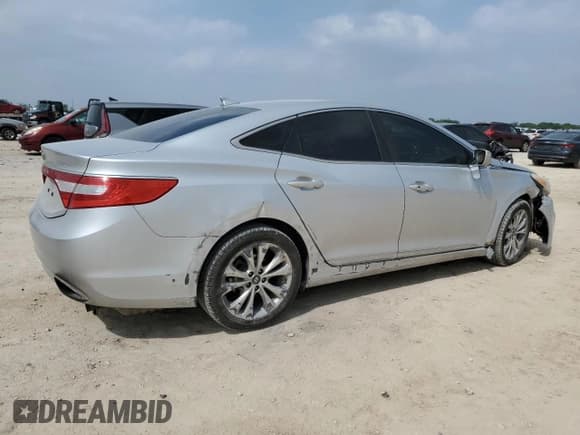 ✅ 2013 Hyundai Azera • VIN: KMHFG4JG3DA254032 • Лот: 51163975. Опубликован ранее на Copart с пробегом 108 990 миль. Бесплатный доступ к архиву аукционных продаж из США и подробный отчёт об истории автомобиля на DreamBid. Изображение 3.