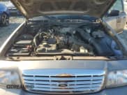 ✅ 2005 Ford Police Interceptor • VIN: 2FAFP71W95X164931 • Lot: 90994005. Listed on Copart with 168,289 mi. Free auction sales archive from the USA and detailed vehicle history report at DreamBid. Image 11.