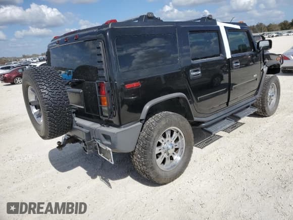 ✅ 2003 Hummer H2 • VIN: 5GRGN23U33H102570 • Lot: 77259654. Listed on Copart with Not provided. Free auction sales archive from the USA and detailed vehicle history report at DreamBid. Image 3.