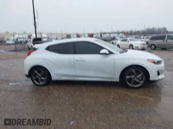 2019 Hyundai Veloster 2.0 z VIN KMHTG6AF7KU017934, wystawiony jako IAAI lot #41700835 z przebiegiem 50 594 mil mil oraz . Historia ofert i sprzedaży dostępna na DreamBid. Obrazek 13.