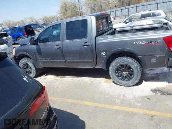✅ 2012 Nissan Titan SL • VIN: 1N6BA0EC7CN304116 • Lot: 41950392. Listed on IAAI with 194,352 mi. Free auction sales archive from the USA and detailed vehicle history report at DreamBid. Image 14.