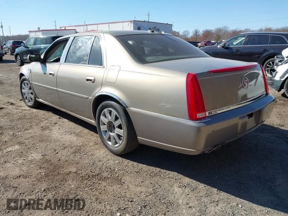 ✅ 2007 Cadillac DTS Luxury I • VIN: 1G6KD57Y97U110573 • Lot: 43699585. Listed on IAAI with 79,651 mi. Free auction sales archive from the USA and detailed vehicle history report at DreamBid. Image 3.