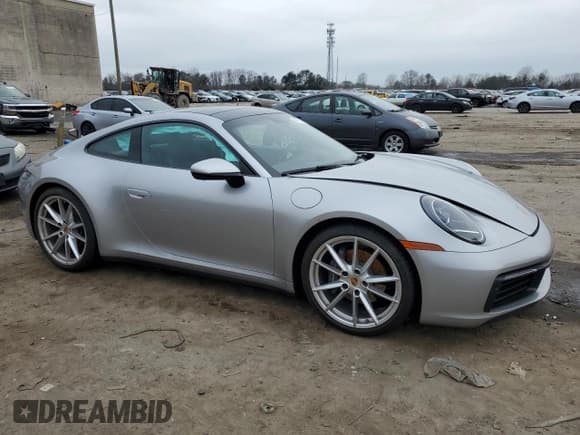 ✅ 2022 Porsche 911 Carrera • VIN: WP0AA2A98NS205474 • Lot: 40023494. Listed on Copart with 9,889 mi. Free auction sales archive from the USA and detailed vehicle history report at DreamBid. Image 4.