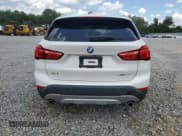 ✅ 2019 BMW X1 sDrive28i • VIN: WBXHU7C51K5L11243 • Lot: 61818985. Wystawiony na Copart z przebiegiem 64 734 mil. Bezpłatny archiwum sprzedaży aukcyjnych z USA i szczegółowy raport historii pojazdu na DreamBid. Zdjęcie 6.