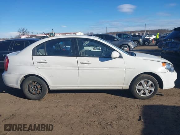 ✅ 2011 Hyundai Accent GLS • VIN: KMHCN4AC0BU606100 • Лот: 41293628. Опубликован ранее на IAAI с пробегом 121 471 миль. Бесплатный доступ к архиву аукционных продаж из США и подробный отчёт об истории автомобиля на DreamBid. Изображение 13.
