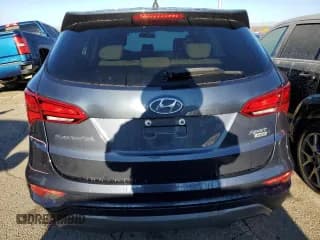 ✅ 2018 Hyundai Santa Fe 2.4L • VIN: 5NMZTDLB2JH051617 • Лот: 43172403. Опубликован ранее на Copart с пробегом 79 092 миль. Бесплатный доступ к архиву аукционных продаж из США и подробный отчёт об истории автомобиля на DreamBid. Изображение 6.