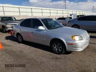 2003 Hyundai Accent GL z VIN KMHCG45C13U494378, wystawiony jako Copart lot #63713375 z przebiegiem 114 772 mil mil oraz Szkoda całkowita • Salvage title. Historia ofert i sprzedaży dostępna na DreamBid. Obrazek 4.