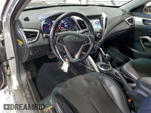 ✅ 2012 Hyundai Veloster w/Gray Int • VIN: KMHTC6AD8CU080360 • Lot: 94063745. Wystawiony na Copart z przebiegiem 128 840 mil. Bezpłatny archiwum sprzedaży aukcyjnych z USA i szczegółowy raport historii pojazdu na DreamBid. Zdjęcie 8.