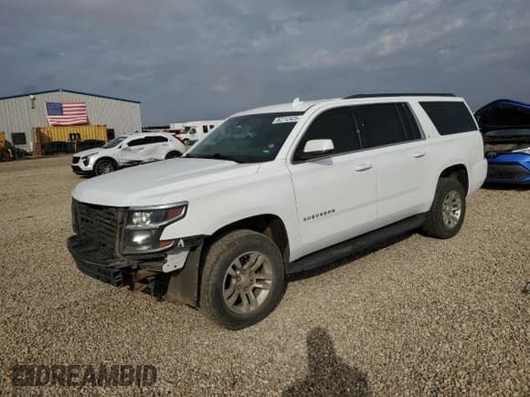 ✅ 2020 Chevrolet Suburban LT • VIN: 1GNSCHKC5LR119885 • Lot: 82712425. Listed on Copart with 220,324 mi. Free auction sales archive from the USA and detailed vehicle history report at DreamBid. Image 1.