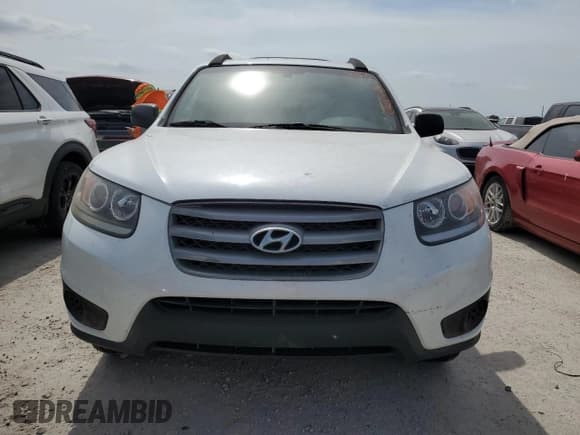 ✅ 2012 Hyundai Santa Fe GLS • VIN: 5XYZGDAB7CG097500 • Lot: 76201154. Listed on Copart with 51,100 mi. Free auction sales archive from the USA and detailed vehicle history report at DreamBid. Image 5.