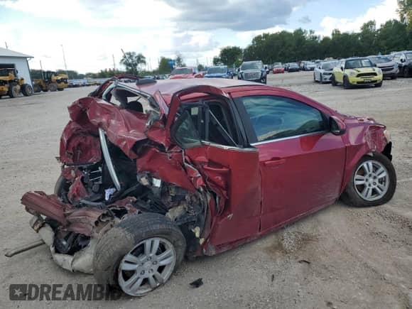 2015 Chevrolet Sonic LT с VIN 1G1JC5SH8F4128301, выставлен на аукционе Copart как лот 81758445 с пробегом 139 956 миль миль и Списание • Salvage title. История ставок и продаж доступна на DreamBid. Изображение 3.