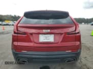 ✅ 2021 Cadillac XT4 FWD Luxury • VIN: 1GYAZAR44MF031416 • Лот: 82414724. Опубликован ранее на Copart с пробегом 60 392 миль. Бесплатный доступ к архиву аукционных продаж из США и подробный отчёт об истории автомобиля на DreamBid. Изображение 6.