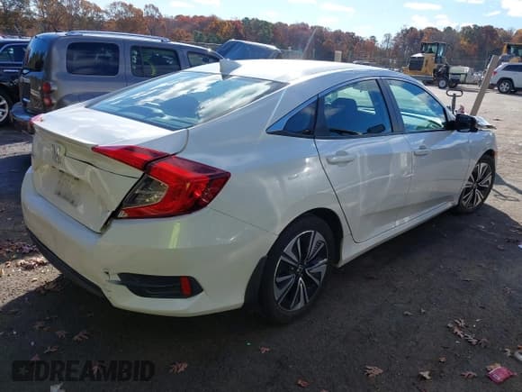 ✅ 2017 Honda Civic EX-T • VIN: 19XFC1F3XHE020963 • Лот: 43646572. Опубликован ранее на IAAI с пробегом 94 379 миль. Бесплатный доступ к архиву аукционных продаж из США и подробный отчёт об истории автомобиля на DreamBid. Изображение 4.